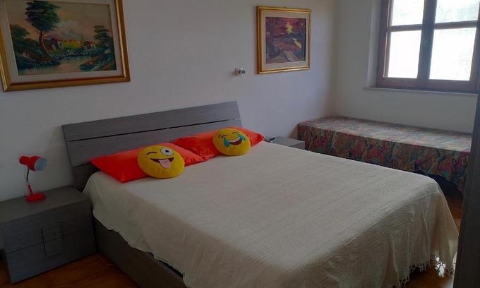Portoscuso Apartment | Delightful Home with Kitchen and Family-Friendly Amenities