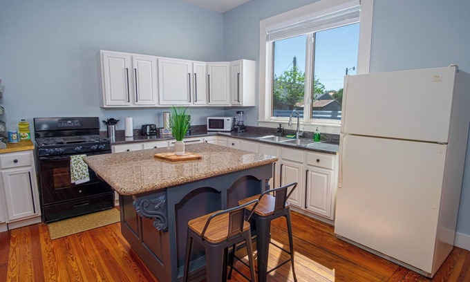 Near East Side Cottage | Exclusive 3BR/2BA Retreat in Downtown's Vibrant Core