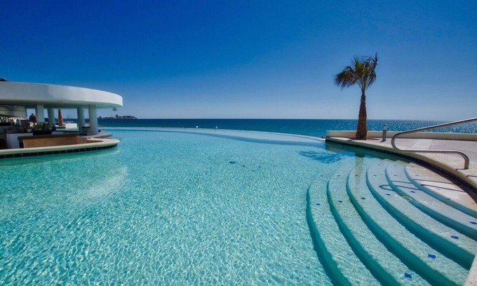 Sandy Beach Villa | Cozy 4 Bedroom Beach Villa with Pool at Las Palmas Resort