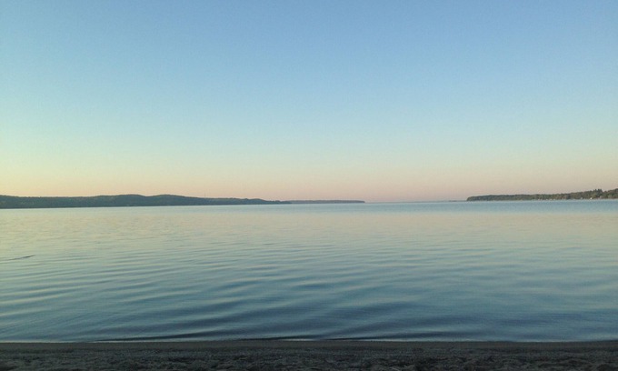 Suttons Bay House | Impressive 5BR Home with Private Beach & Custom Dock