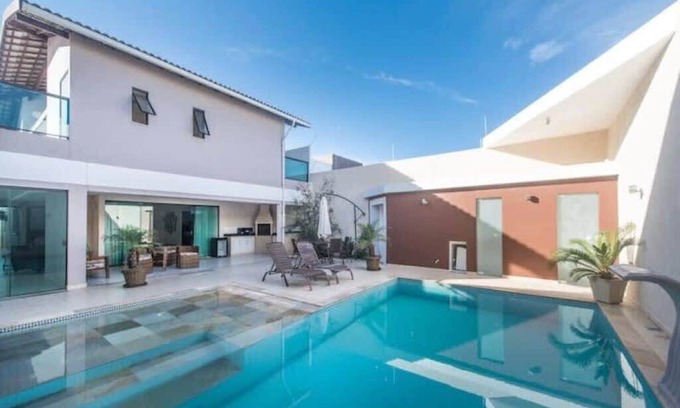 Portinho House | Elegant Mansion Retreat with Pool & Spa Amenities