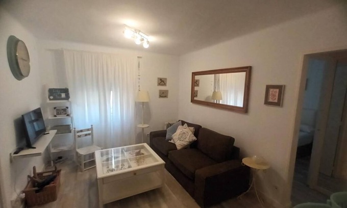 Caldes d'Estrac Apartment | Beachfront Apartment with Spa and Family-Friendly Amenities