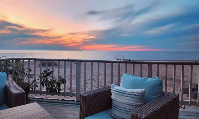 Sea Breeze Cottage | Inviting Beachfront Cottage with Fire Pit Near Amusement Park