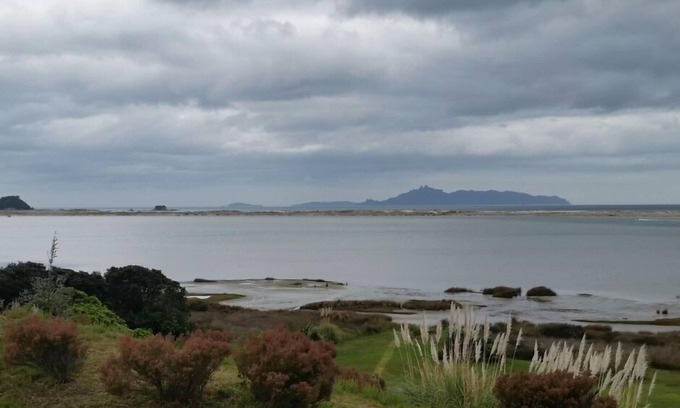 Mangawhai Heads House | Scenic Coastal and Estuary Views with Pool Access
