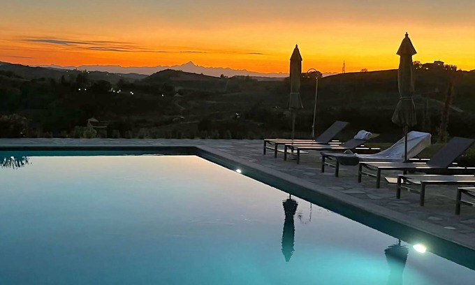 Nizza Monferrato Villa | Inviting Villa with Infinity Pool and Ocean Views in Nizza Monferrato
