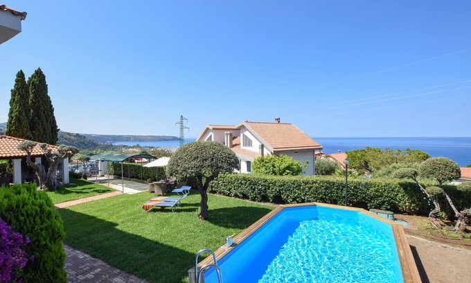 Praia a Mare House | Relaxing 6-Bedroom Getaway in Praia a Mare with Ocean Views