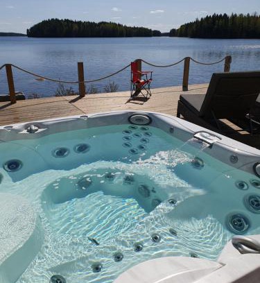 Kuopio House | Inviting Log Cabin Retreat on Kallavesi with Hot Tub