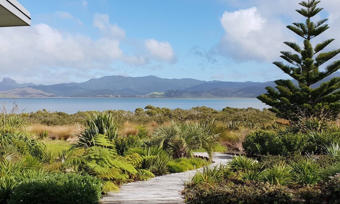 Matarangi House | Modern Harbourfront Beach House with Ocean Views & Breakfast