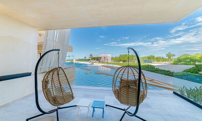 Telchac Puerto Apartment | Stunning oceanfront retreat with a pool and great views, perfect for families