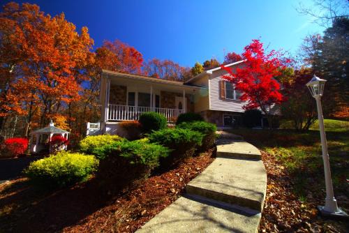 East Stroudsburg Villa | Elegant Poconos Villa with Hot Tub, Pool, and Game Room