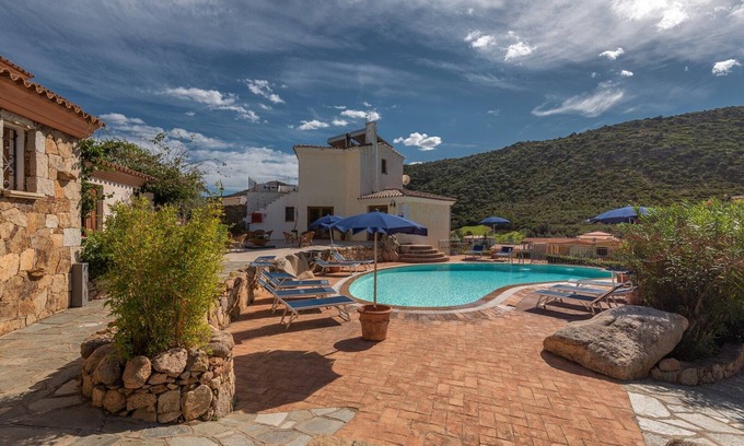 Tanaunella Apartment | Inviting Residence Bouganvillage: 2 Bedroom Getaway