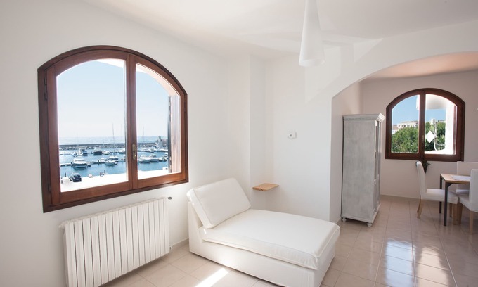 Portoscuso Apartment | Oceanfront Attic with Breathtaking Views & Top Ratings
