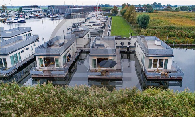 Municipality of Aalsmeer Boat Rental | Charming Aalsmeer Ship Retreat with Family-Friendly Kitchen