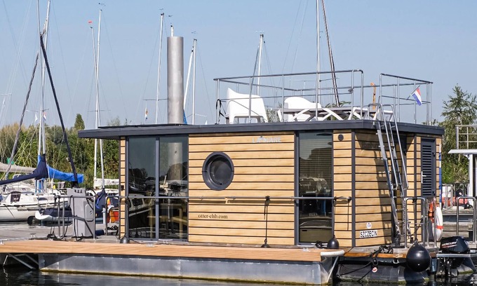 Ophoven Boat Rental | Modern Houseboat with Cozy Terraces and Lake View for Families
