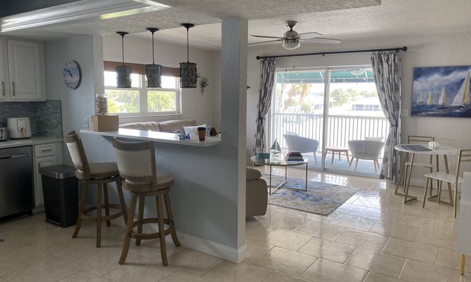 Capri Isle Apartment | Beautiful Waterfront Apartment with Dock and Ocean View