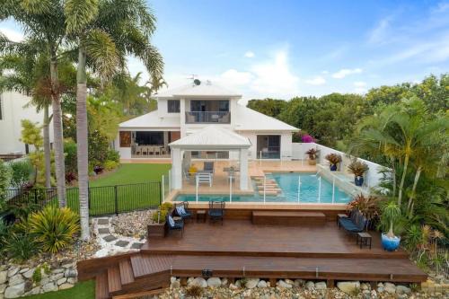Twin Waters House | Inviting Waterfront Coastal Retreat with Pool & Pet-Friendly