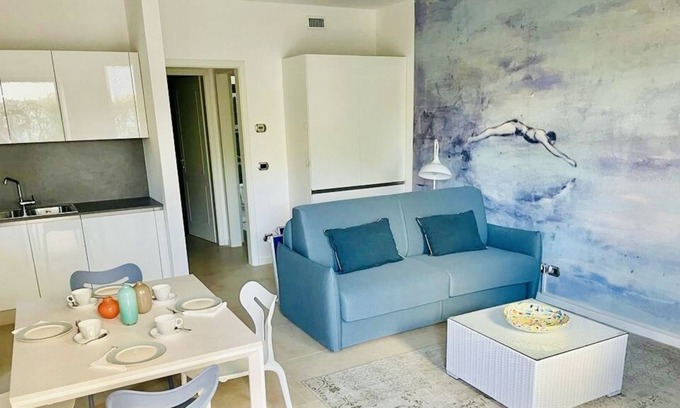 Santa Maria in Stelle Apartment | Stylish apartment with a garden on the beach