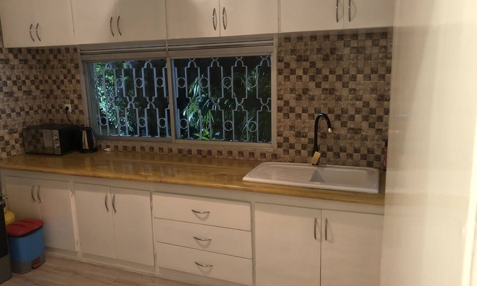 Douala Apartment | Modern Apartment with Free WiFi and Kids-Friendly Amenities