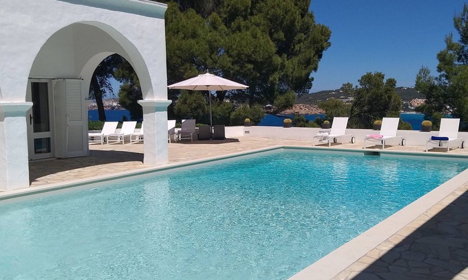 Sant Josep de sa Talaia Villa | Elegant Villa with Ocean Views, Pool & Private Gardens