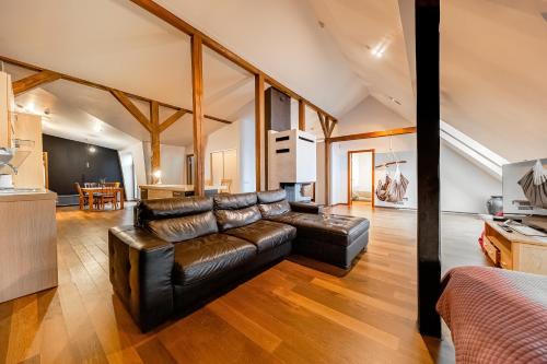 Centrs Apartment | Stylish Mansard in Riga's Vibrant Center - Rated 9.5/10