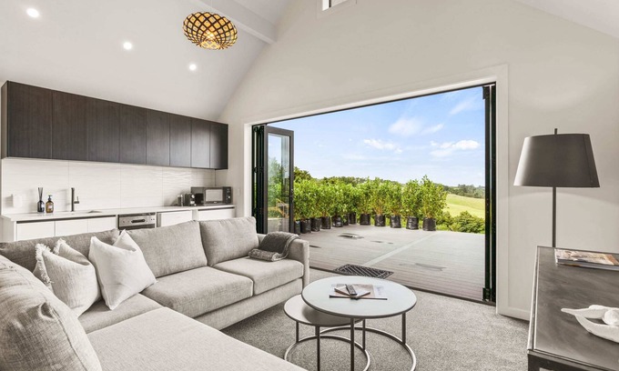 Mangawhai Villa | Stylish Space with a Green Rural outlook peaking to the Mangawhai Sand Dunes and