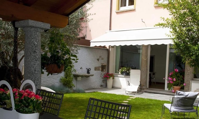 Cambiasca Apartment | Stylishly furnished 3-room apartment with 2 terraces and cultivated private garden