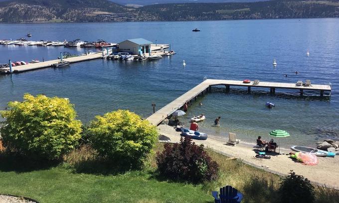 Central Okanagan Condo | Stylist lakefront condo. Steps from the beach!