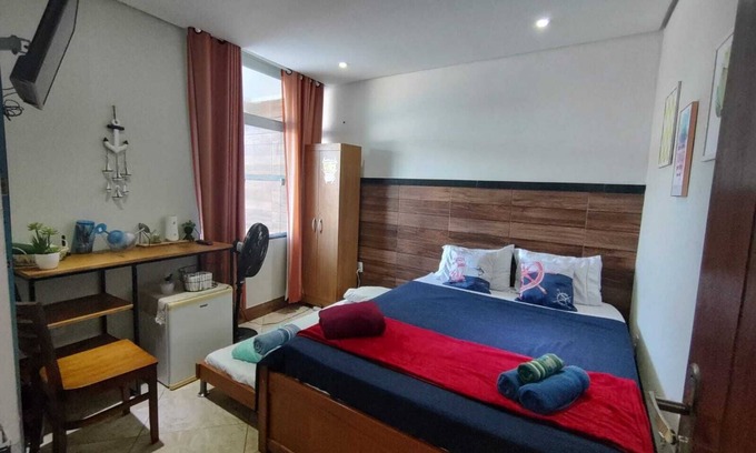 Sao Vicente de Paula Apartment | Ocean View Suite with Gourmet Area, Near Praia dos Anjos