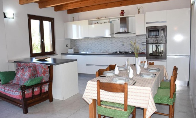 Martis House | Relax at Su Cuile House: Oceanfront Retreat with Barbecue