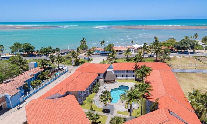 Coroa Vermelha Hotel | Relax at Sueds Segundo Sol: Pool, Spa & Family Fun Awaits