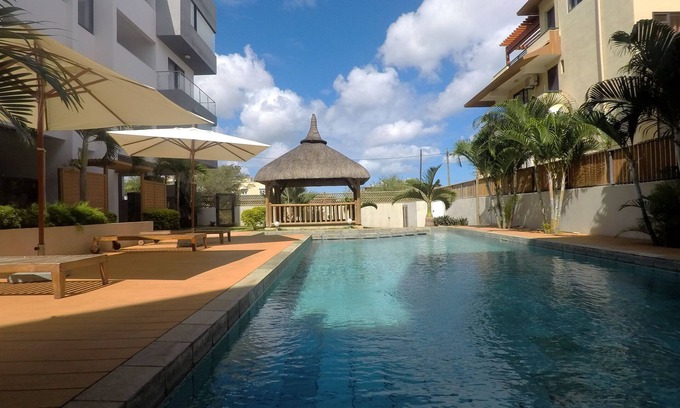 Flic-en-Flac Apartment | Relax at Sugar Reef Complex in Flic en Flac with Ocean View