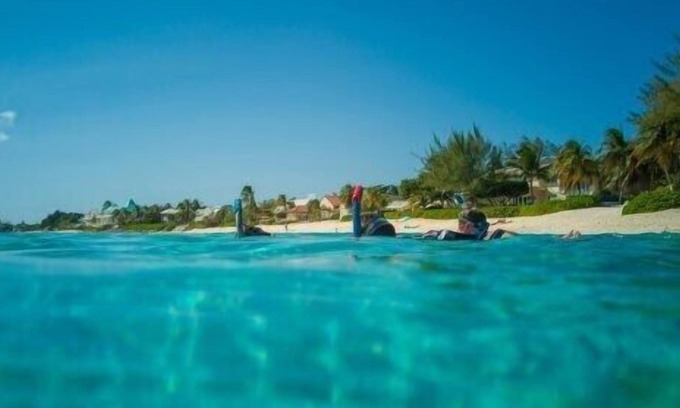 West Bay Apartment | Top-Rated Suite with Beach Shuttle and Family-Friendly Amenities