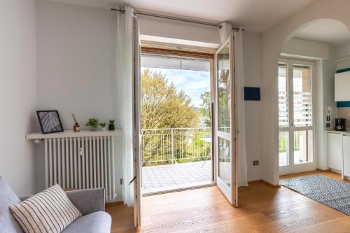 Arona Apartment | Suite 51: Oceanfront Retreat with Private Parking, Rated 9.7