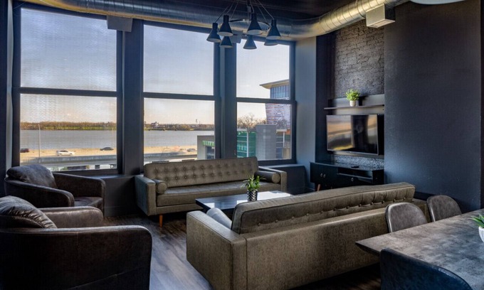 West Main Historic District Condo | Elegant City Loft Escape with River Views & Great Amenities
