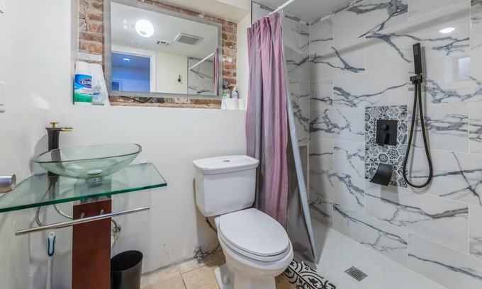 Greenville House | Inviting Suite at the Spahaus with Pool and Kitchen Amenities