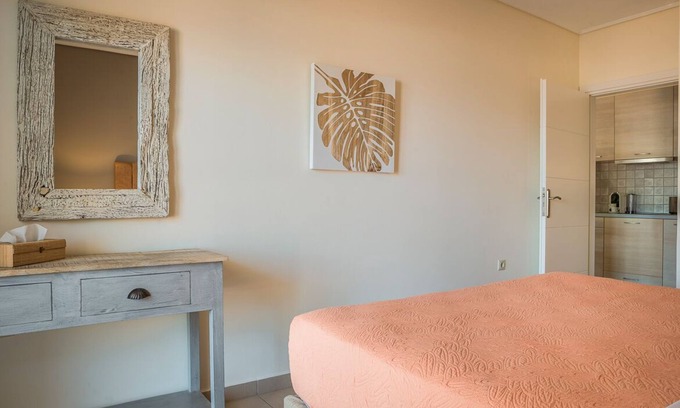 Karavomylos Apartment | Oceanfront Suite Tangerine - Family-Friendly Getaway