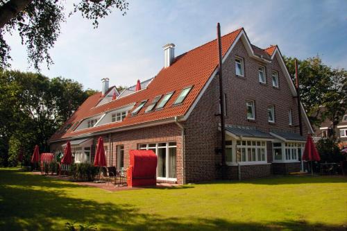 Langeoog Hotel | Pet-Friendly Comfort at Suitenhotel Idyll Heckenrose