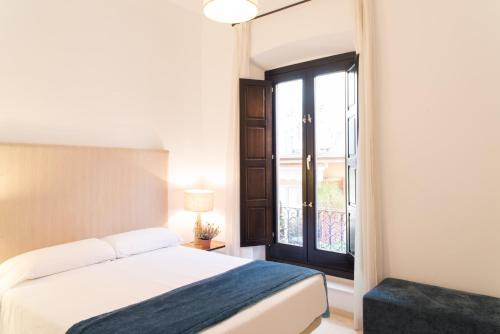 Central District Apartment | Family-Friendly Suites Campo del Príncipe - 4-Star Comfort