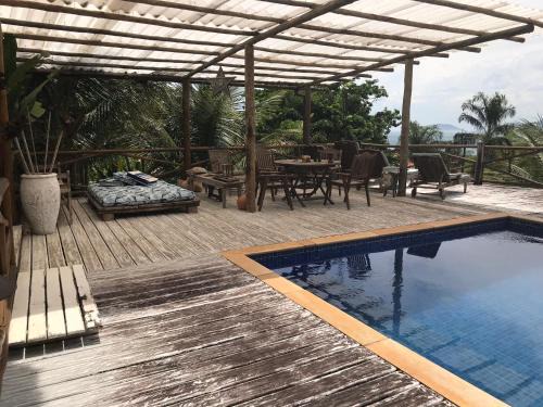 Praia Grande House | Elegant Suites de Charme Feiticeira with Inviting Pool