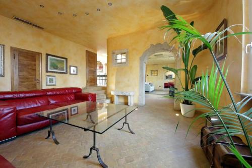 Rione XI Sant'Angelo Apartment | Stylish Penthouse Suite with Two Terraces and Hot Tub