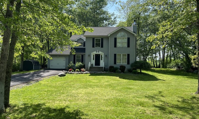 East Stroudsburg House | Discover a Poconos Oasis with Breathtaking Lake Views