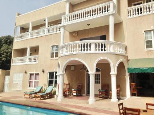 Senegambia Apartment | Discover Summer Grove Villa: Family-Friendly with Pool & Breakfast