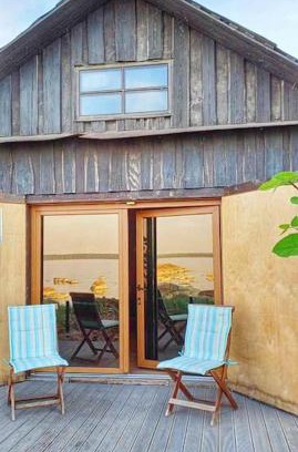 Kasmu Apartment | Seaside Escape: Summerhouse with Private Beach & Sauna