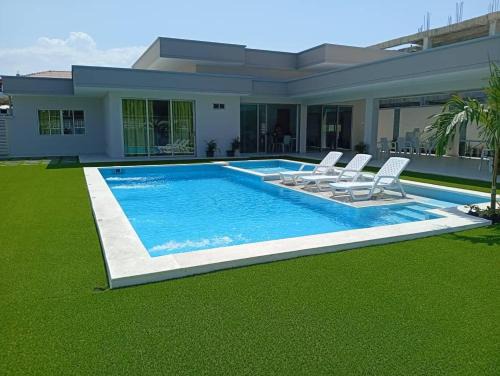 Puerto Colombia House | Cozy Blue Premium Beach: Pet-Friendly with Ocean Views