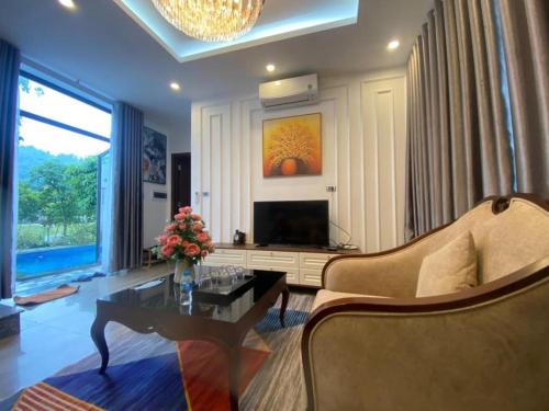 Luong Son Apartment | Relax at Sun Blush Villa & Resort with Oceanfront Amenities