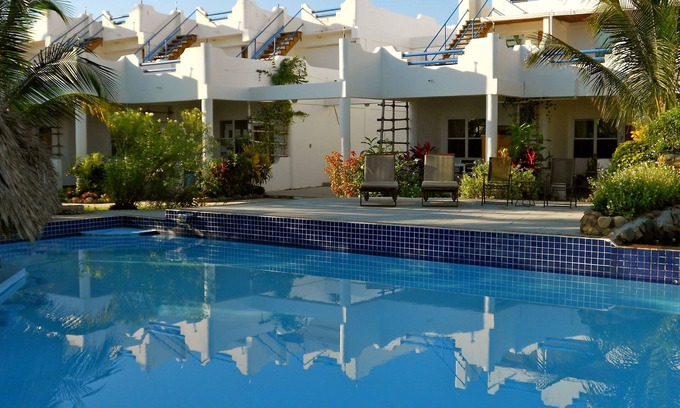 Sittee River Villa | Relax and Unwind on Your Rooftop Deck with Ocean Views