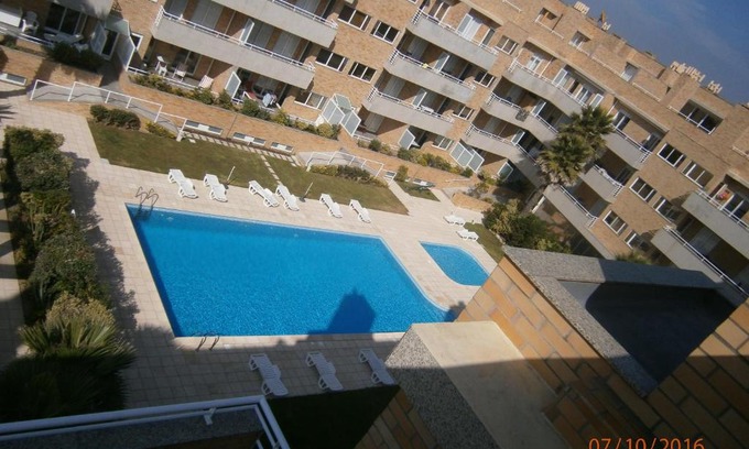 Mozelos Apartment | Relax by the Pool and Beach at Our Oceanfront Retreat