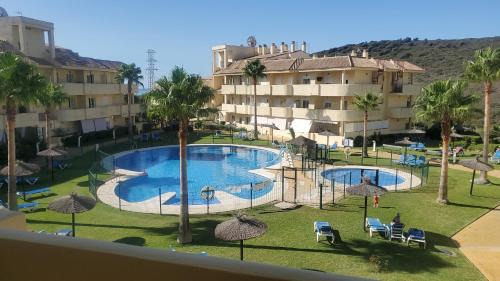 Puerto de la Duquesa Apartment | Relax with Sun, Sand & Refreshing Drinks at Our Hotel