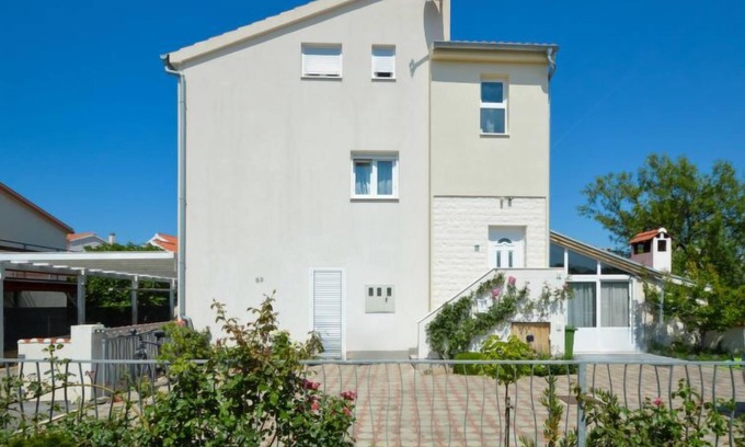 Brodarica Apartment | Oceanfront Retreat: Sun Seeker by Interhome, Rated 10/10