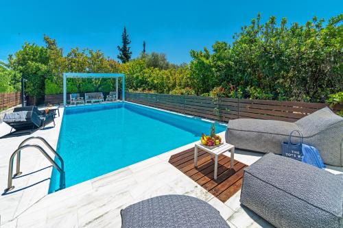 Dorida House | Relaxing Sun Villa Glyfada: 4-Star Oceanfront Retreat